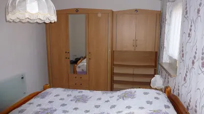 Ein Bett oder Betten in einem Zimmer der Unterkunft Ferienwohnung Irene