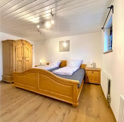 Ein Bett oder Betten in einem Zimmer der Unterkunft Ferienwohnung Vogel