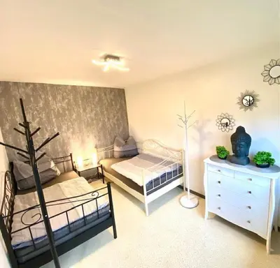 Ein Bett oder Betten in einem Zimmer der Unterkunft Ferienwohnung Vogel
