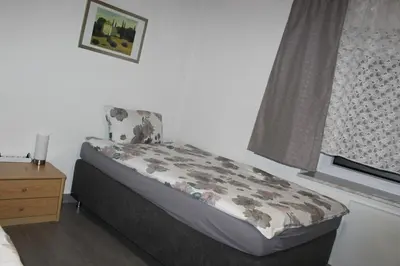 Ein Bett oder Betten in einem Zimmer der Unterkunft WILA Enchenreuth