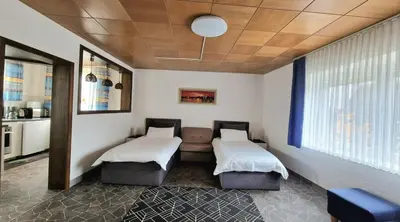 Ein Bett oder Betten in einem Zimmer der Unterkunft WILA Enchenreuth