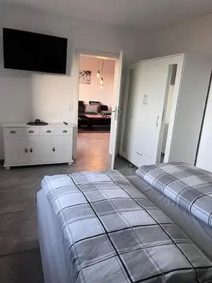 Ein Bett oder Betten in einem Zimmer der Unterkunft Ferienwohnung Behnke