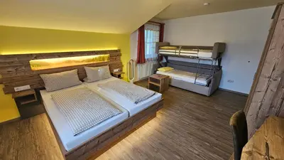 Ein Bett oder Betten in einem Zimmer der Unterkunft Pension Grünhaid