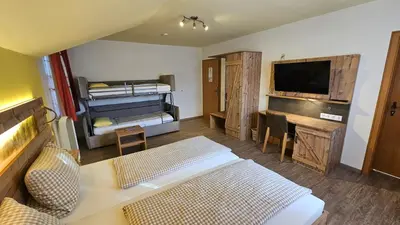 Ein Bett oder Betten in einem Zimmer der Unterkunft Pension Grünhaid