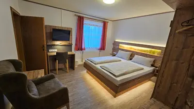Ein Bett oder Betten in einem Zimmer der Unterkunft Pension Grünhaid