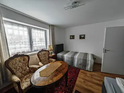 Ein Bett oder Betten in einem Zimmer der Unterkunft Apartment E1 - Gut ausgestattete 3-Zimmerwohnung 68 qm für 1-5 Personen 2xZZ 1xSC