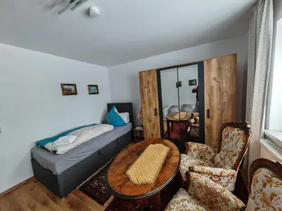 Ein Bett oder Betten in einem Zimmer der Unterkunft Apartment E1 - Gut ausgestattete 3-Zimmerwohnung 68 qm für 1-5 Personen 2xZZ 1xSC