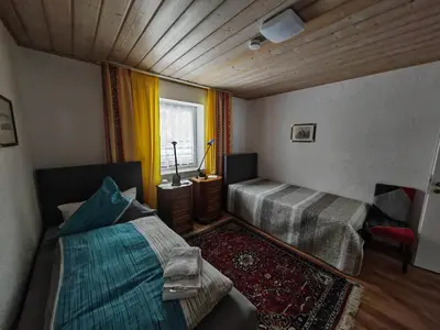 Ein Bett oder Betten in einem Zimmer der Unterkunft Apartment E1 - Gut ausgestattete 3-Zimmerwohnung 68 qm für 1-5 Personen 2xZZ 1xSC
