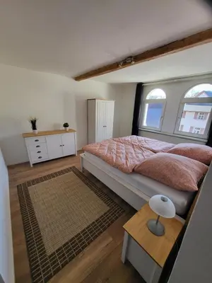 Ein Bett oder Betten in einem Zimmer der Unterkunft Ferienwohnung Sonnenhaus
