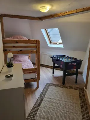 Ein Bett oder Betten in einem Zimmer der Unterkunft Ferienwohnung Sonnenhaus