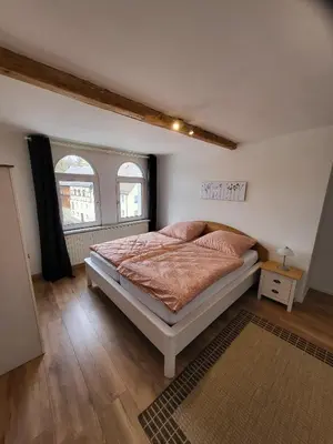 Ein Bett oder Betten in einem Zimmer der Unterkunft Ferienwohnung Sonnenhaus
