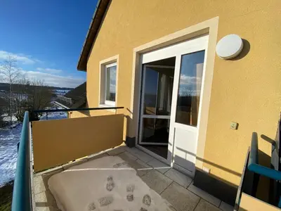 Ein Balkon oder eine Terrasse in der Unterkunft Ferienwohnung Auersbergblick