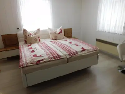 Ein Bett oder Betten in einem Zimmer der Unterkunft Haus Eugen