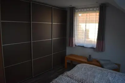 Ein Bett oder Betten in einem Zimmer der Unterkunft Ferienwohnung 360°