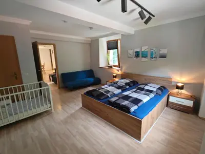Ein Bett oder Betten in einem Zimmer der Unterkunft VIA MALA Apartment