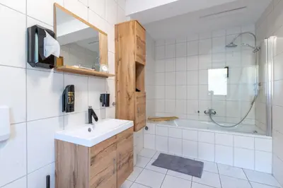 Ein Badezimmer in der Unterkunft VIA MALA Apartment