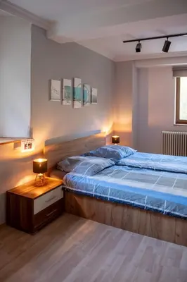 Ein Bett oder Betten in einem Zimmer der Unterkunft VIA MALA Apartment