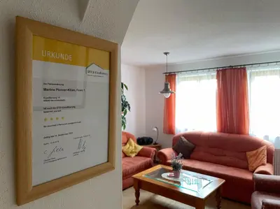 Ein Sitzbereich in der Unterkunft Ferienwohnungen Am Kirchberg Kapplblick
