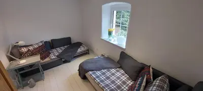 Ein Sitzbereich in der Unterkunft Ferienwohnungen Marienweiher