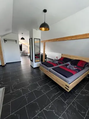 Ein Bett oder Betten in einem Zimmer der Unterkunft Die Loft