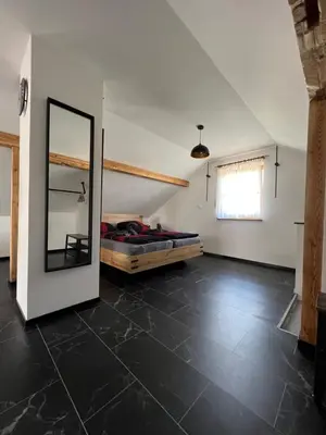 Ein Bett oder Betten in einem Zimmer der Unterkunft Die Loft