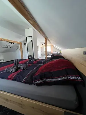 Ein Bett oder Betten in einem Zimmer der Unterkunft Die Loft
