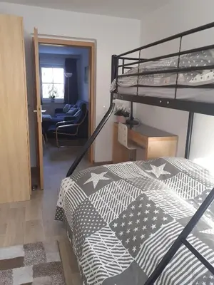 Ein Bett oder Betten in einem Zimmer der Unterkunft Ferienwohnung Zern