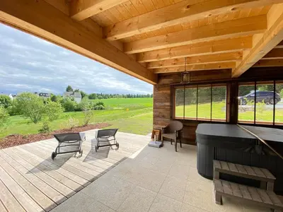 Ein Sitzbereich in der Unterkunft Frankenwald-Lodge
