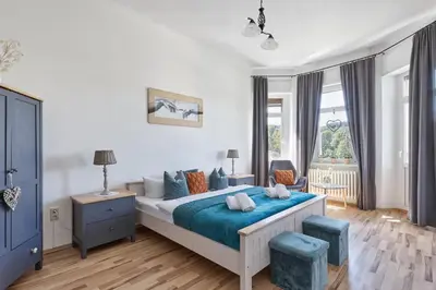 Ein Bett oder Betten in einem Zimmer der Unterkunft Familien Ferienwohnung Haus Waldeck