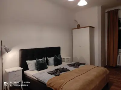 Ein Bett oder Betten in einem Zimmer der Unterkunft Familien Ferienwohnung Haus Waldeck
