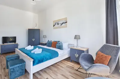 Ein Bett oder Betten in einem Zimmer der Unterkunft Familien Ferienwohnung Haus Waldeck