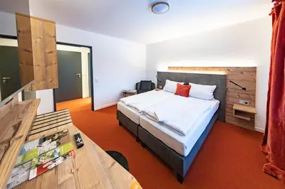 Ein Bett oder Betten in einem Zimmer der Unterkunft Am Ochsenkopf