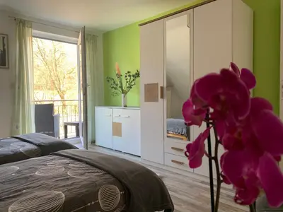 Ein Bett oder Betten in einem Zimmer der Unterkunft Schöne Ferienwohnung in Schauenstein-Hof im Frankenwald mit Loggia 100qm