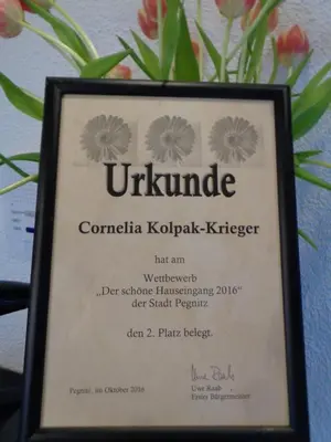Ein Zertifikat, Auszeichnung, Logo oder anderes Dokument, das in der Unterkunft Cornelia Kolpak-Krieger ausgestellt ist