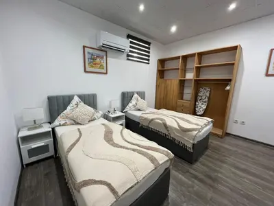 Ein Bett oder Betten in einem Zimmer der Unterkunft Ferienwohnungen Yanev- Hof