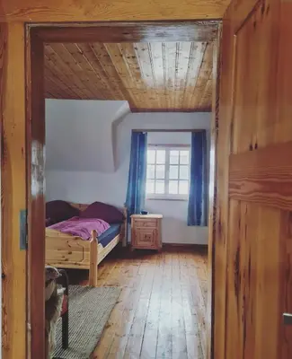 Ein Bett oder Betten in einem Zimmer der Unterkunft Ferienhaus Hildegard & Horst - Urlaub im Herzen des Fichtelgebirge