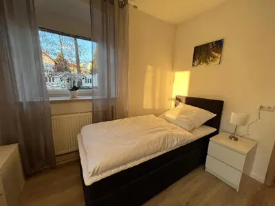 Ein Bett oder Betten in einem Zimmer der Unterkunft Schlossblick