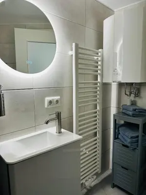 Ein Badezimmer in der Unterkunft Rotmain Apartments