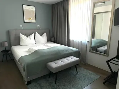 Ein Bett oder Betten in einem Zimmer der Unterkunft Rotmain Apartments