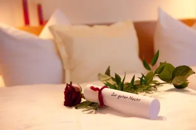 Ein Bett oder Betten in einem Zimmer der Unterkunft Landhotel Gruber