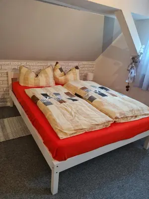 Ein Bett oder Betten in einem Zimmer der Unterkunft Haus Steindöbra