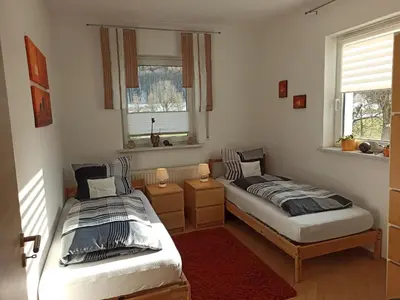 Ein Bett oder Betten in einem Zimmer der Unterkunft Ferienwohnung am Hopfenstodl