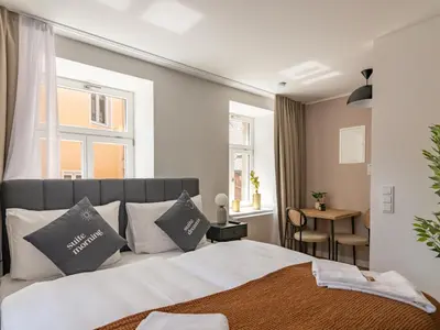 Ein Bett oder Betten in einem Zimmer der Unterkunft Limehome Bayreuth Spitalgasse