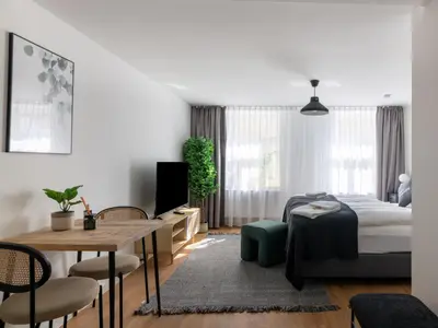 Ein Bett oder Betten in einem Zimmer der Unterkunft Limehome Bayreuth Spitalgasse