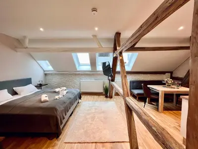 Ein Bett oder Betten in einem Zimmer der Unterkunft Chalet & Apart Fichtelberger Blick