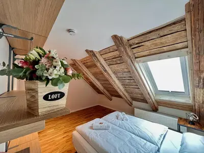 Ein Bett oder Betten in einem Zimmer der Unterkunft Chalet & Apart Fichtelberger Blick