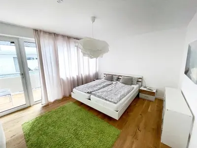 Ein Bett oder Betten in einem Zimmer der Unterkunft Hej - Wohnen charmant & zentral in Weiden