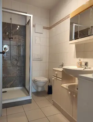 Ein Badezimmer in der Unterkunft Ferienwohnung An der Bimmelbahn - Familie Lange