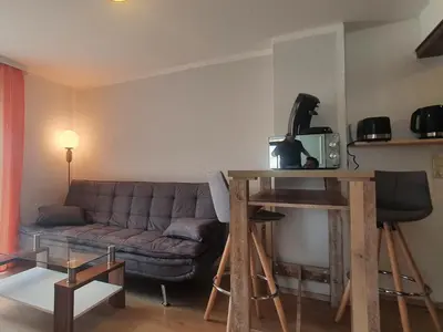 Ein Sitzbereich in der Unterkunft Miniferienwohnung am Wiesenweg