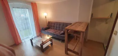 Ein Sitzbereich in der Unterkunft Miniferienwohnung am Wiesenweg